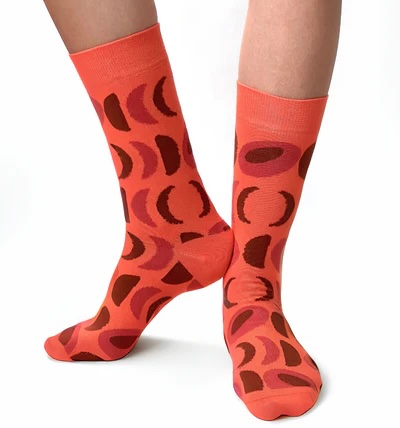 Sikkelcelsokken van Medsocks. Kleur rood/oranje